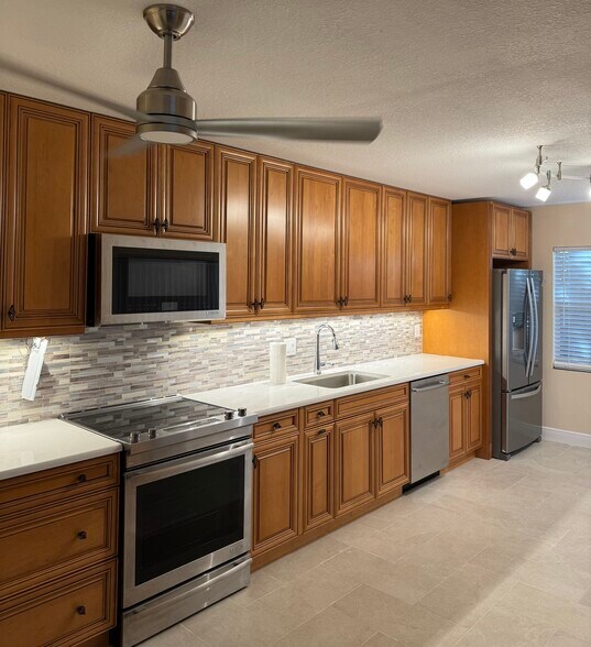 Remodeled kitchen - 3441 SW Sunset Trace Cir