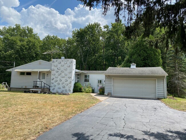 Front of the house-Garage for 2 cars - 1694 E River Rd
