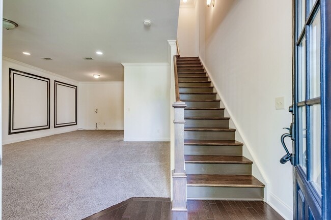 Building Photo - Welcome to this charming end unit townhome