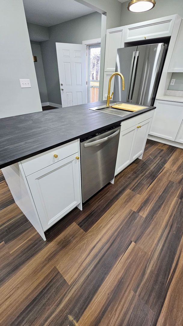 Building Photo - Stunning Renovation Ready for Your Finishing Touches!