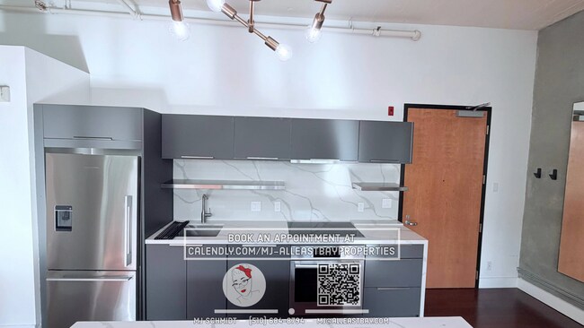 Building Photo - Sunny loft with in unit gym, heated floors in bathroom, contemporary kitchen, and includes water/...