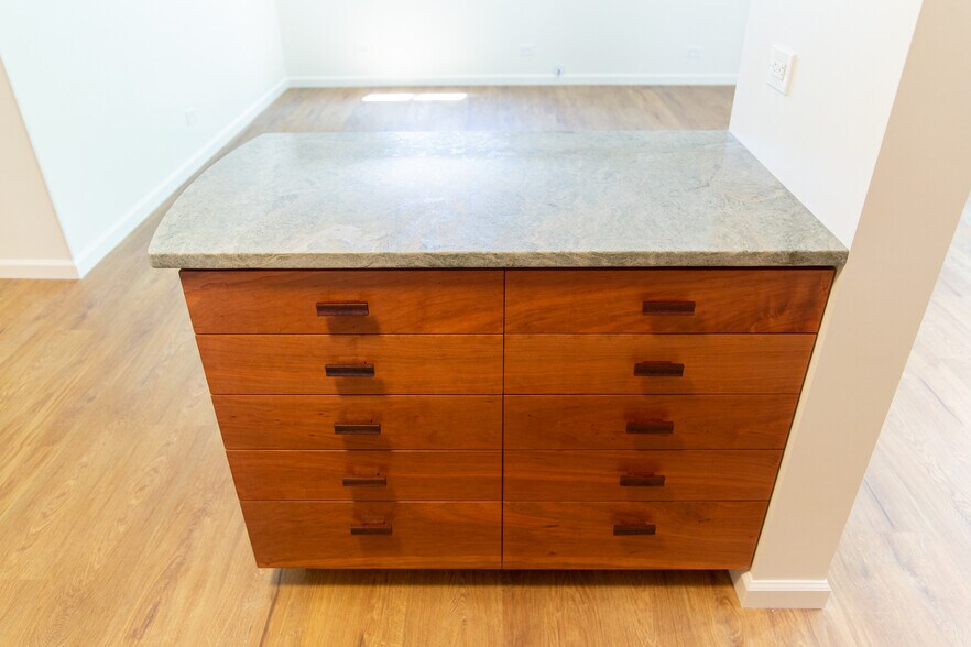 Drawers on the kitchen side, bookshelves facing the living room - 511 1st St N