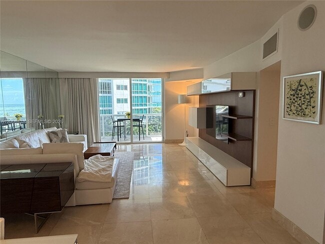 Building Photo - 10275 Collins Ave