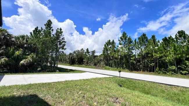 Building Photo - Spacious 3-Bedroom Home with Garage & Pati...