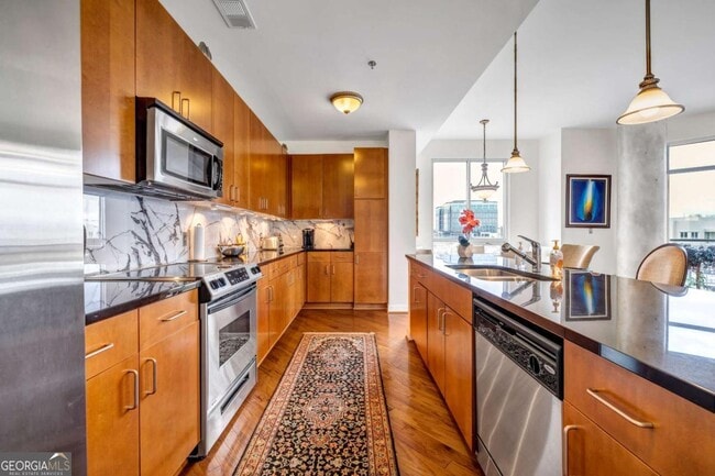 Building Photo - 711 Cosmopolitan Dr NE