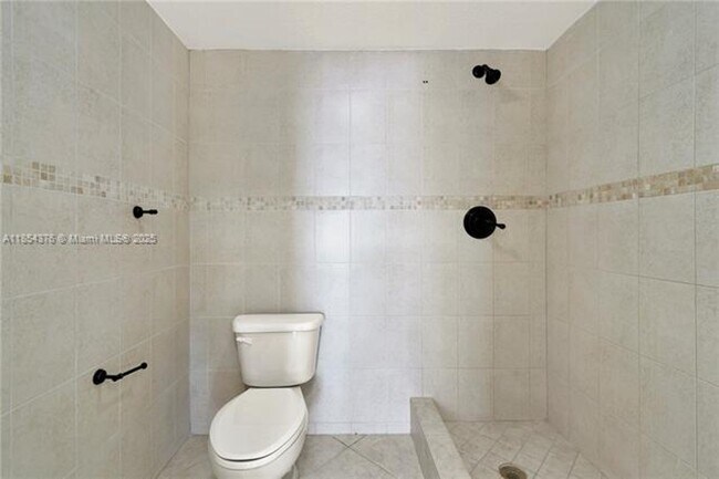 Building Photo - 1335 W 68th St