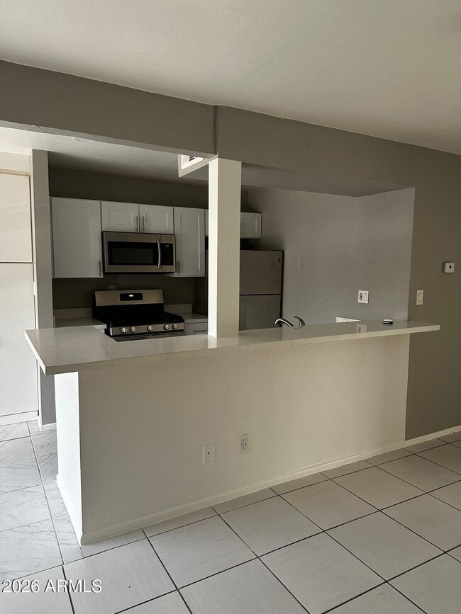 Building Photo - 1701 W Tuckey Ln