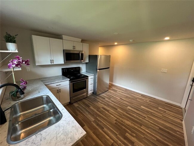 Building Photo - 1006 E 26th Ave