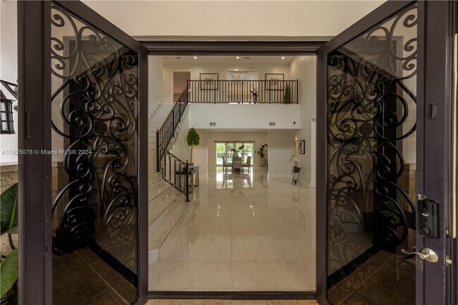 Building Photo - Amazing 2 Story House in Coral Gables
