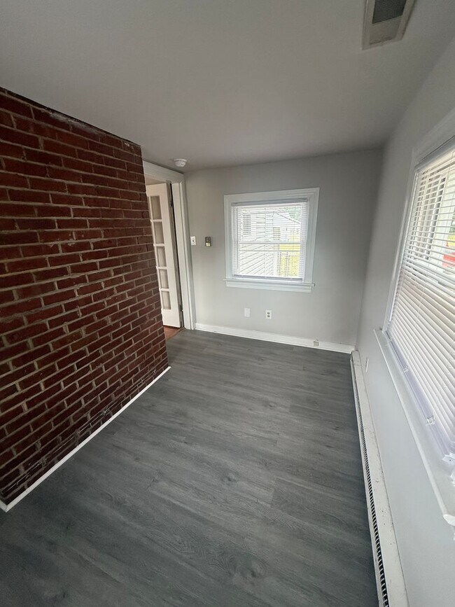Building Photo - 2-bedroom 1 bathroom Cottage on a large lot with 2 large storage building on site