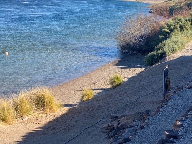 Building Photo - Waterfront 2BR 2B Condo Lower Level, gated with tennis,pool,spa,PRIVATE BEACH/DOCK