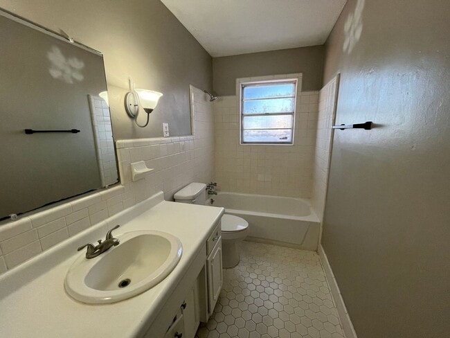 Building Photo - Renovated 4 Bedroom 2 Bath Home with Carport and Double Garage!!