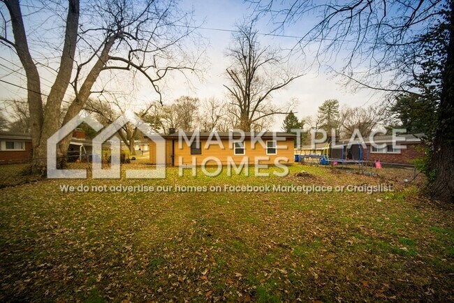 Building Photo - 6855 Woodhurst Dr