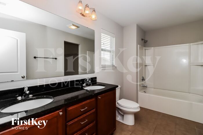 Building Photo - 5695 Saint Adriens Way