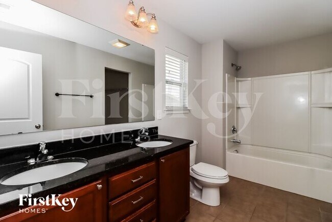 Building Photo - 5695 Saint Adriens Way