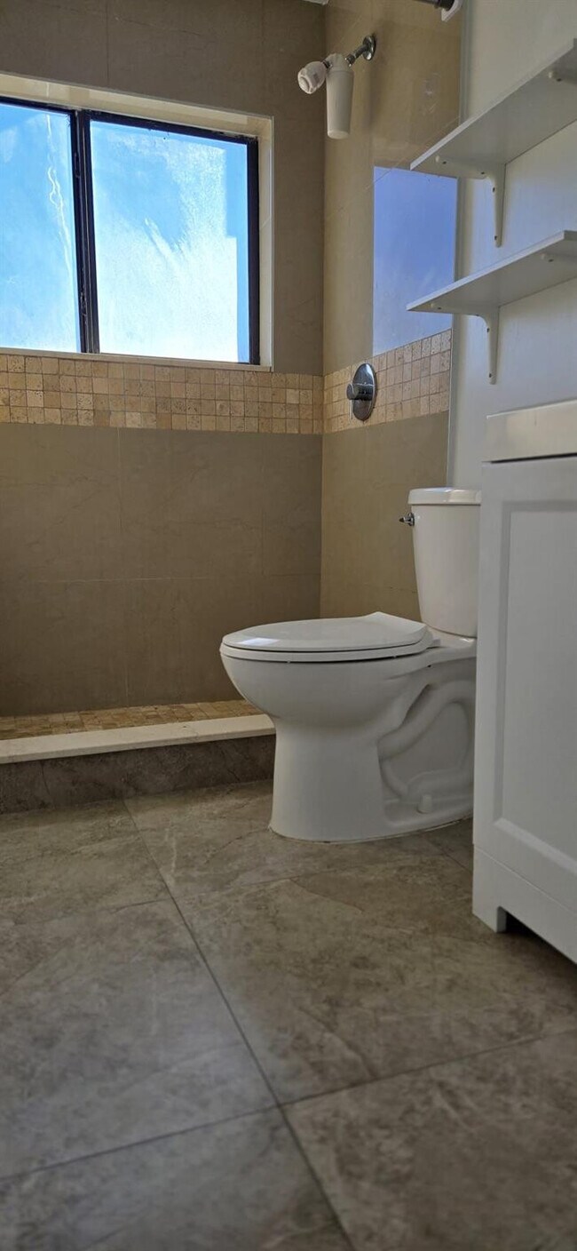 Building Photo - 10930 Royal Palm Blvd