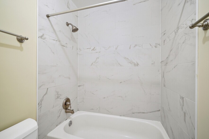 3rd floor hall bath tub and shower - 1140 N Taylor St