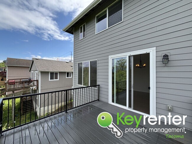 Building Photo - Stylish 4-Bedroom Home with Finished Basem...