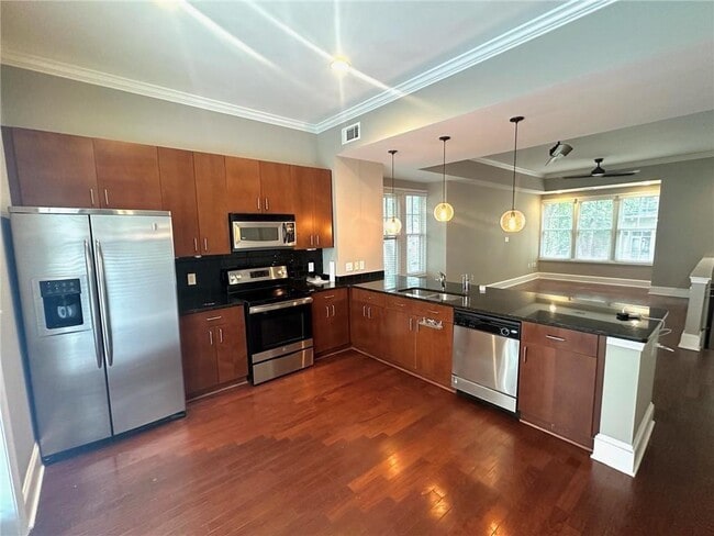 Building Photo - 726 Cosmopolitan Dr NE