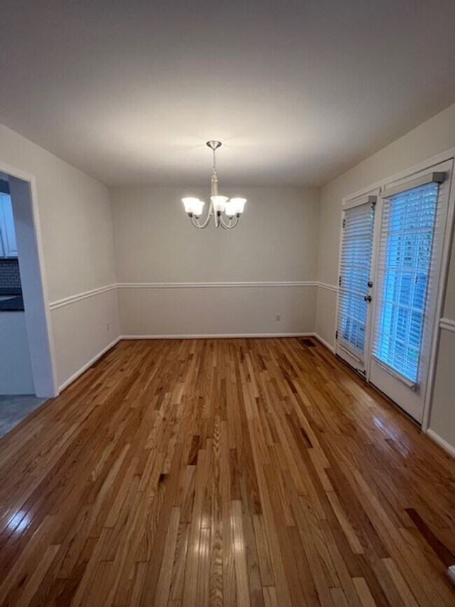 Building Photo - CHARMING TOWNHOME LOCATED IN HIGHLAND HALL...