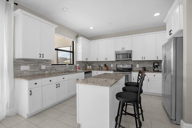Building Photo - 9657 Moss Rose Way
