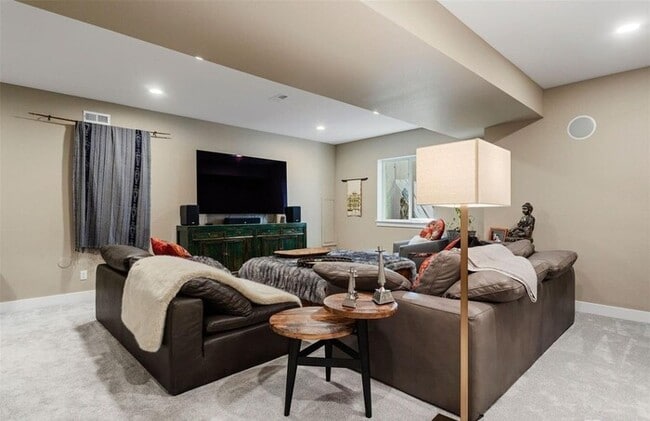 Building Photo - Modern 3BR Home with Finished Basement & Private Courtyard in Lowry