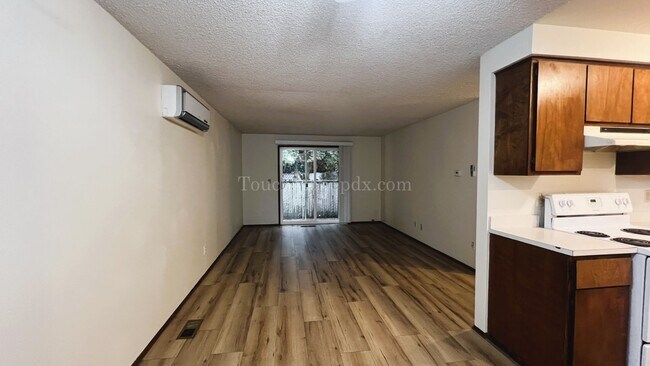 Building Photo - Updated 2 Bedroom Featuring New Plank Flooring