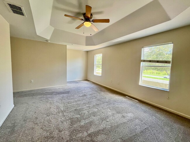 Building Photo - 3 Bedroom, 2.5 Bathroom 2-Story Townhouse in Gated Community - Kissimmee