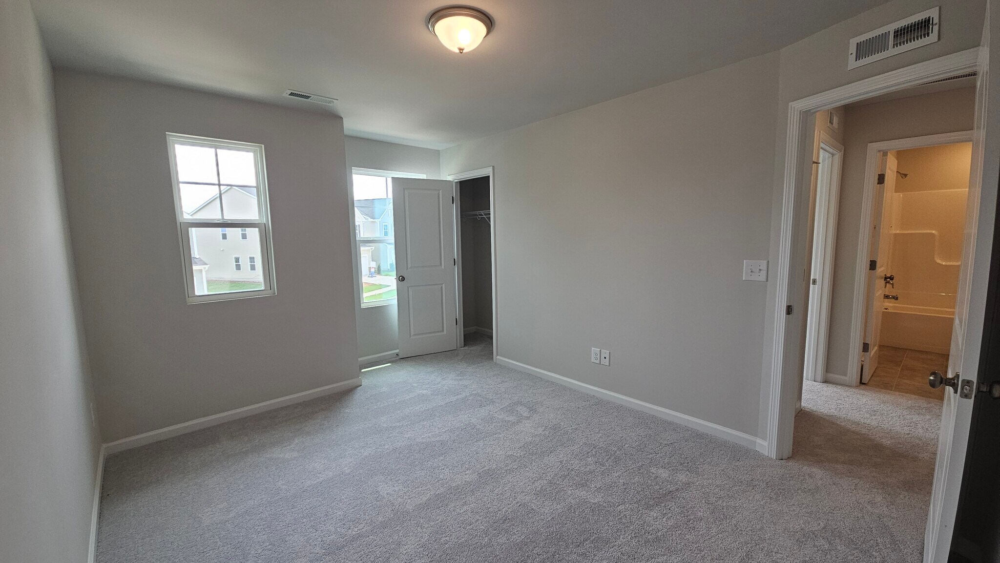 The other bedroom (Shades have since been installed!) - 2207 Cape May Ln