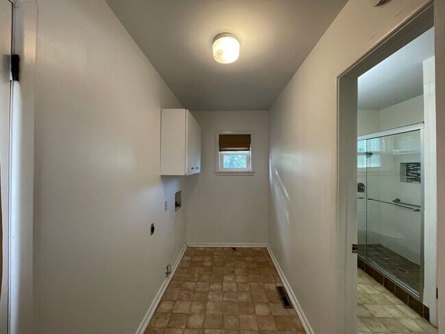 Building Photo - Your New Snyder Sanctuary: Modern Updates, Massive Storage & a Cozy Porch