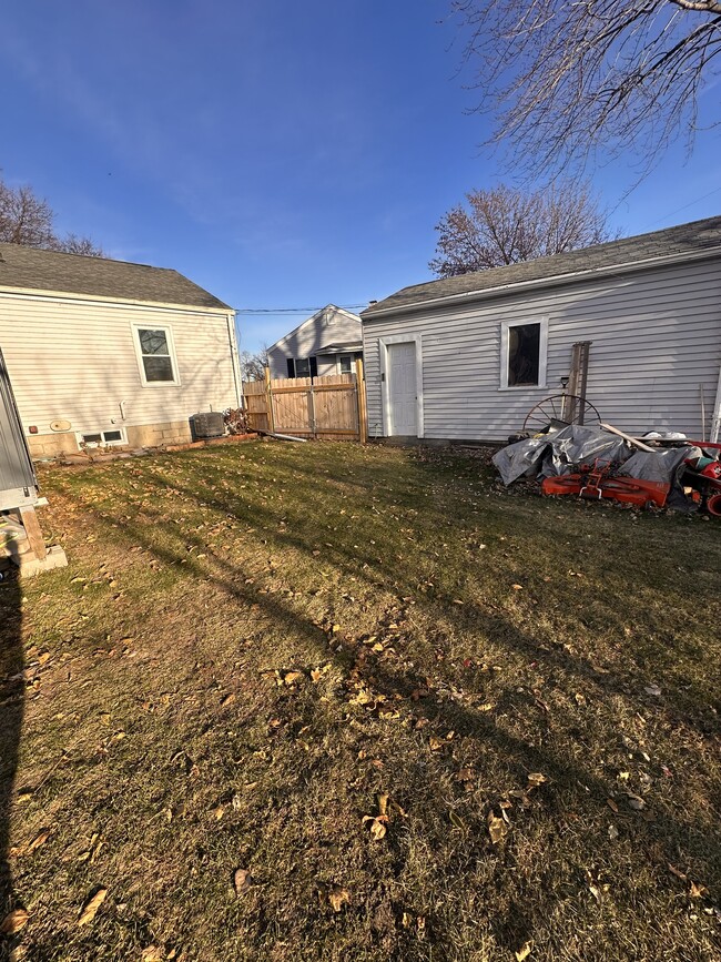 Back of house by garage w/ gate - 1602 Ashland Ave