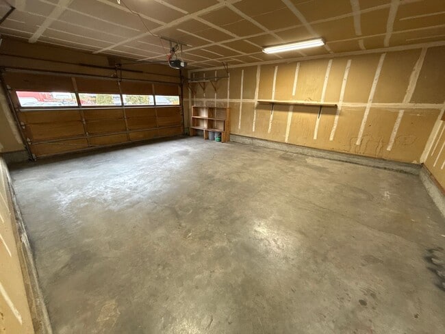 Building Photo - RV Parking, SMALL DOG OK, NE 3 Bdrm, 2 Bath House, All Appliances, Wood Stove, Dbl. Garage