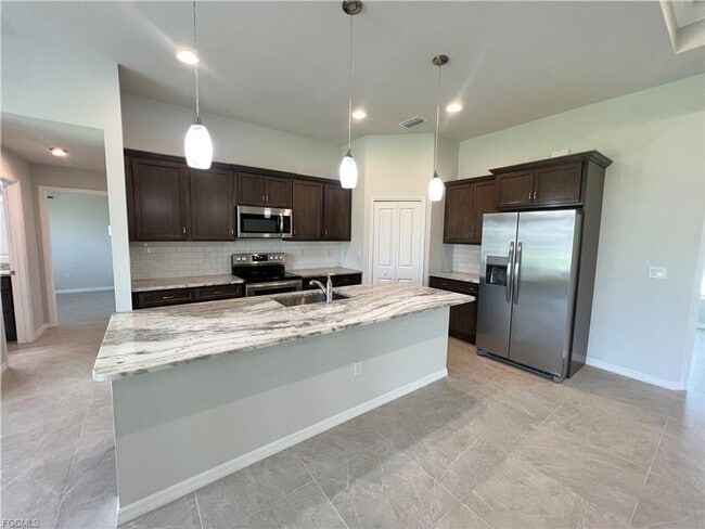 Building Photo - Stunning 4 Bed 3 Car Garage Home Available Now Near Burnt Store Rd