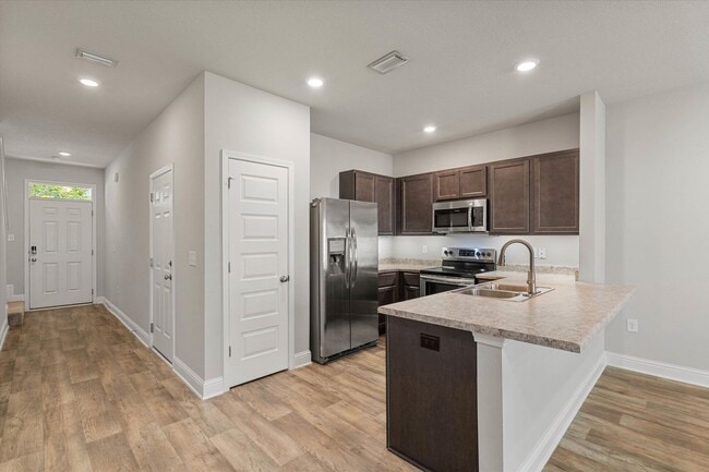 Building Photo - HEART OF DAPHNE TOWNHOUSE WITH GARAGE