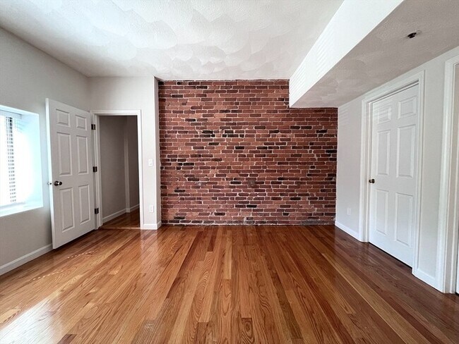 Building Photo - Updated 2BR / 2BA Condo with Private Deck & In-Unit Laundry at Academy Park