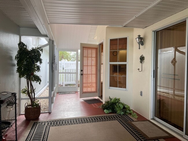 Building Photo - NEWLY LISTED 2BD/2BA/2CG Villa