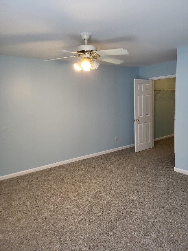 Building Photo - "Charming 2-Bedroom Townhouse on Skillmaster Court with Gleaming Hardwood Floors!"