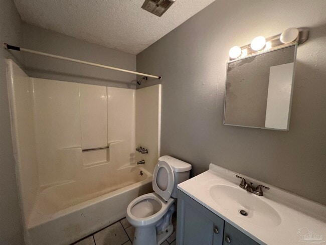 Building Photo - 6809 Tiki Ln