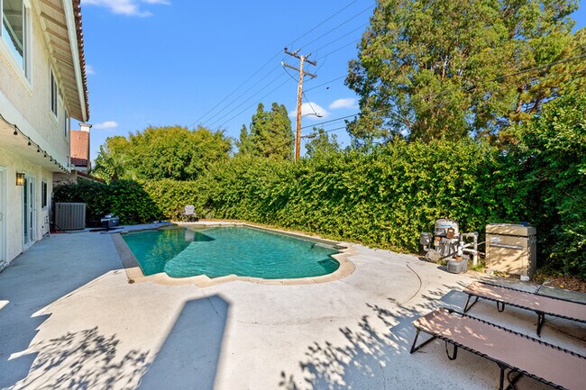 Building Photo - Spacious 4BR Family Retreat w Private Pool