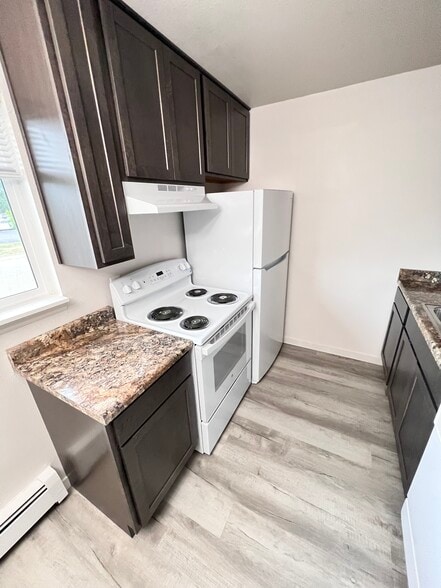 brand new stove, fridge, countertops and cabinets - 3303 Myers Ct