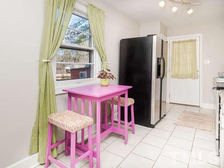 New fridge and breakfast nook - 515 Mayfair St