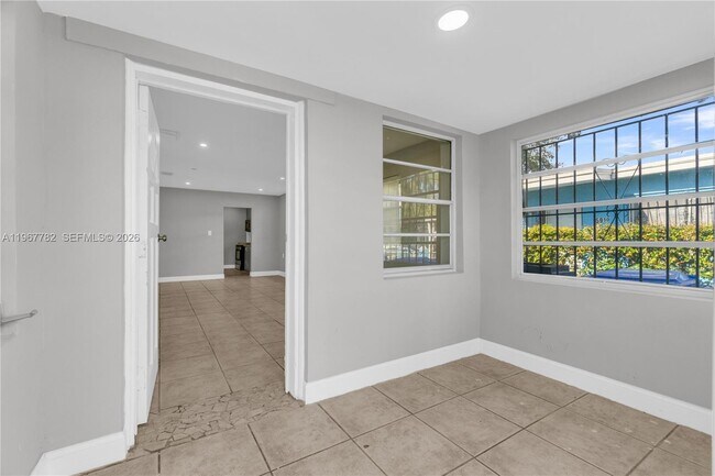 Building Photo - 6940 NW 6th Ct