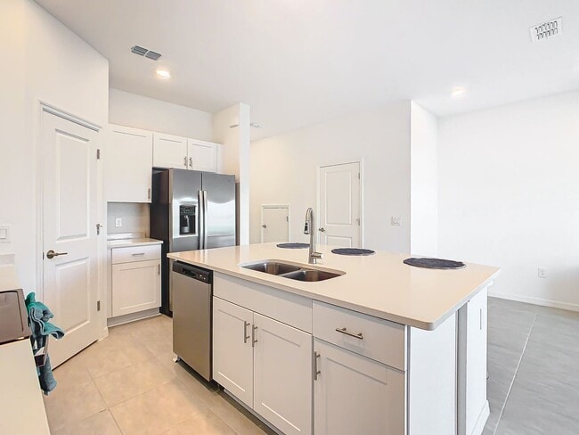 Building Photo - AVAILABLE NOW! 3/2.5 Townhome For Rent in Bellalago!