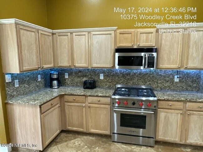 Building Photo - 10375 Woodley Creek Blvd