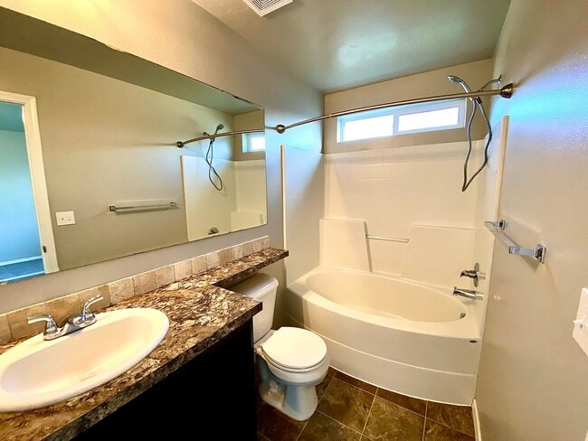 Building Photo - 4 Bedroom + Bonus with 2 baths available 8/22