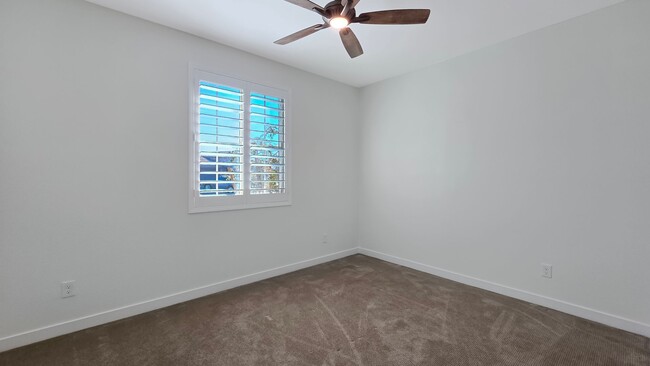 Building Photo - Pristine home in amenity rich Estrella Mountain Ranch!