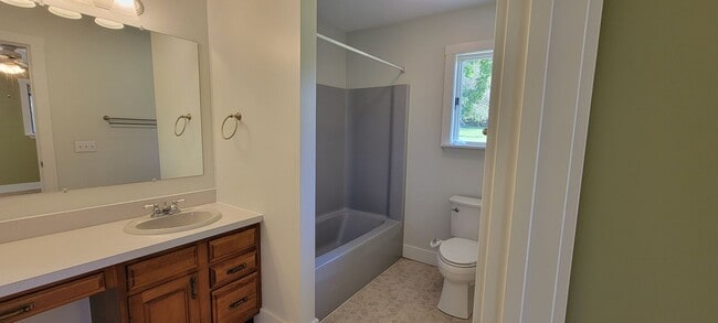Building Photo - Beautiful home with peek a boo views of West Bay on Old Mission Peninsula