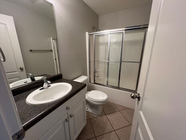 Building Photo - Three Bed / Three Bath with Fenced Yard and Community Pool