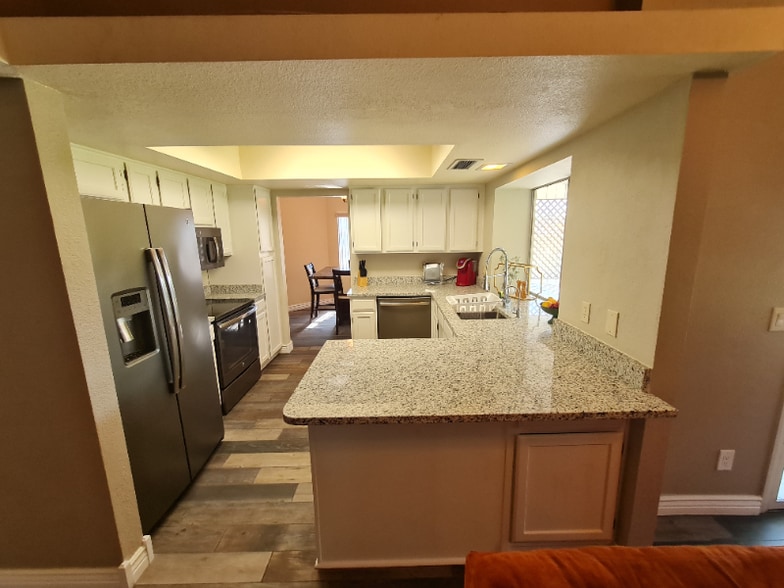 Building Photo - 7944 W Charter Oak Rd