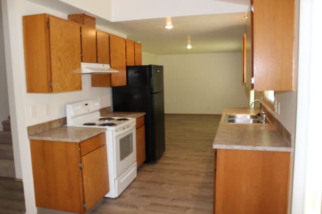 Building Photo - Four bedroom, two bath family home on quie...